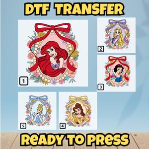 May include: DTF TRANSFER and READY TO PRESS text above and below a collection of five princess designs. Each princess is framed with a floral wreath and a ribbon. The princesses include Ariel, Rapunzel, Snow White, Cinderella, and Belle.