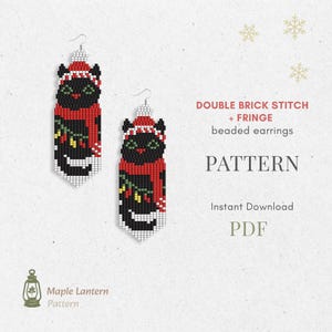 May include: Two beaded earrings featuring a black cat design wearing a red scarf and hat, with a Christmas theme. The earrings are made using a double brick stitch technique. The text on the image says "DOUBLE BRICK STITCH + FRINGE beaded earrings PATTERN Instant Download PDF".