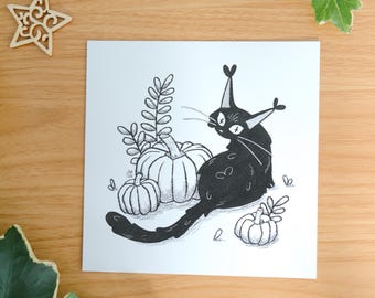 May include: A square art print featuring a black cat with tufted ears and button eyes sitting among three pumpkins and leafy sprigs. The illustration is rendered in black ink on a white background, with the text by mossyleaf studio at the bottom.