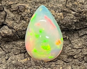 Natural White Opal Cabochon – Pear Shape Ethiopian Gemstone (11x8x5 mm)