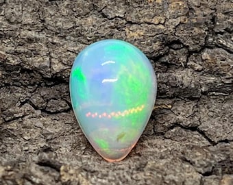 Natural White Opal Cabochon – Pear Shape Ethiopian Gemstone (11x8x5 mm)