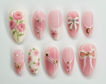 Roze flirtstrik druk op de nagels | Handgeschilderde roos sakura | 3D-lint gouden ster maan | Romantisch lentecadeau nepnagels amandel