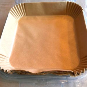 May include: A set of three ceramic mugs with a speckled, matte finish. Each mug features a different color: light blue, cream, and gray. The mugs have a simple, modern design and a comfortable handle. Perfect for coffee or tea.