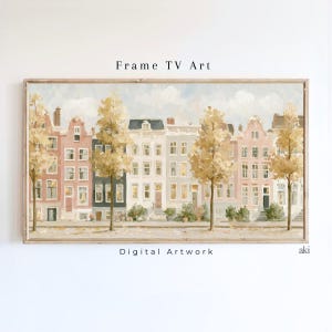 Pode incluir: Uma impressão de arte digital horizontal intitulada Frame TV Art apresentando uma paisagem urbana em estilo de pintura a óleo com casas estreitas em tons de rosa, branco e cinza, intercaladas com árvores amarelo-douradas.