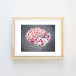 May include: A pink brain with a floral crown of pink, white, and purple flowers on a dark gray background.