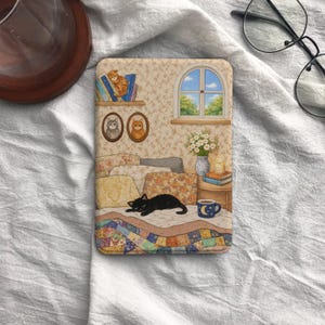 May include: A set of three ceramic nesting bowls in shades of blue, green, and white. The bowls feature a speckled glaze and a simple, modern design. The largest bowl measures approximately 6 inches in diameter.