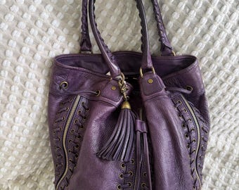 Bolso hobo Luscious de Rebecca Minkoff en color morado.