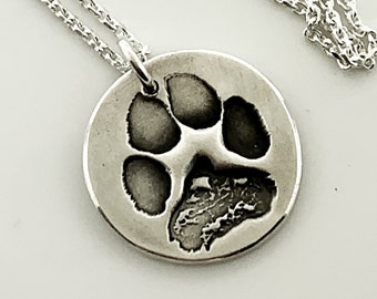 Paw print keepsake, taken from a photograph or ink print