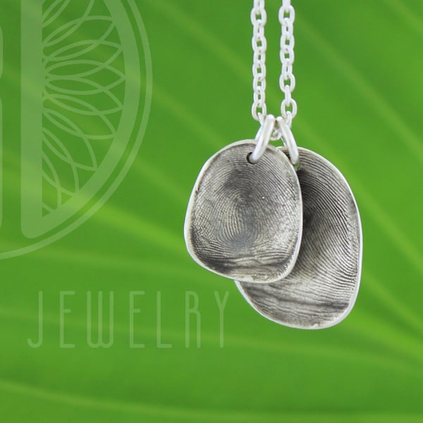 Two Children's fingerprints from a mold in fine silver and sterling silver chain