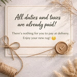 May include: A cream-colored card with the text "All duties and taxes are already paid!" and "There's nothing for you to pay at delivery. Enjoy your new rug!" A twine bow and a wax seal with a checkmark are also visible.