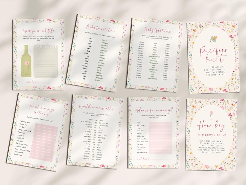 May include: A collection of baby shower game cards with floral borders. Games include "Message in a Bottle," "Baby Translation," "Baby Features," "Pacifier Hunt," "Finish Mommy's Sentences," "World Mommy Rather," "Advice for Mommy?" and "How Big is Mommy's Belly?"