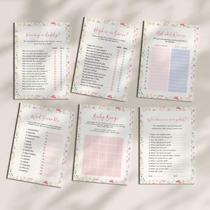 May include: Six baby shower game cards with floral borders. Games include "Mommy or Daddy?", "Higher or Lower?", "Alphabet Women", "Word Scramble", "Baby Bingo", and "Who knows me best?" The cards have pink and blue accents.