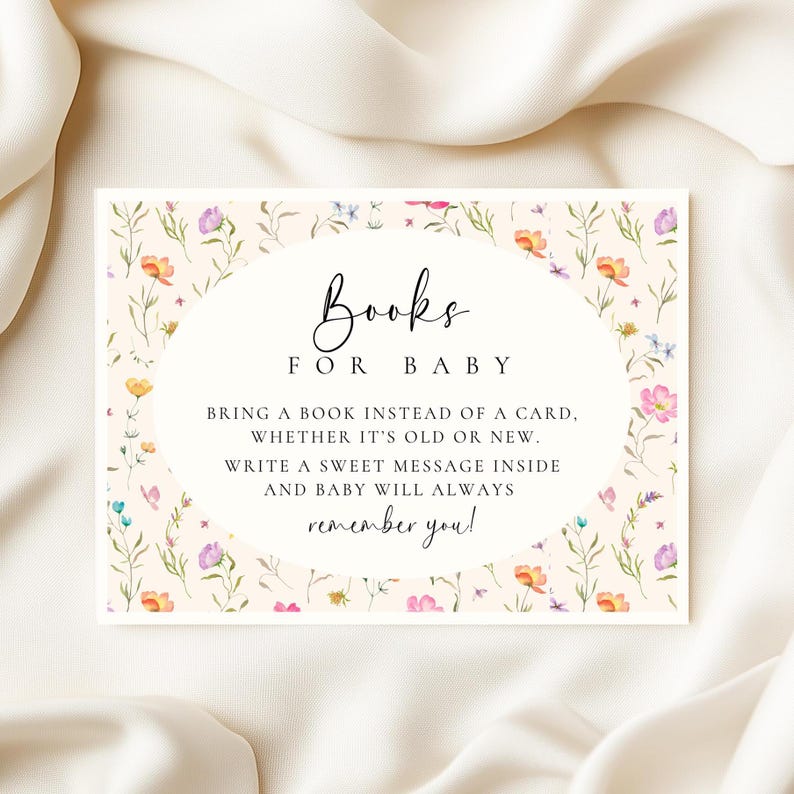 May include: A rectangular baby shower invitation with floral accents. The invitation features the text "Books for Baby" in elegant script, with additional text encouraging guests to bring a book instead of a card.