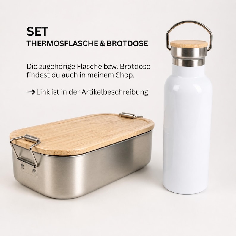 May include: A white thermos bottle with a silver and wood-look lid next to a rectangular stainless steel lunch box with a wooden lid. The text reads: SET THERMOSFLASCHE & BROTDOSE. Die zugeh&ouml;rige Flasche bzw. Brotdose findest du auch in meinem Shop. Link ist in der Artikelbeschreibung.