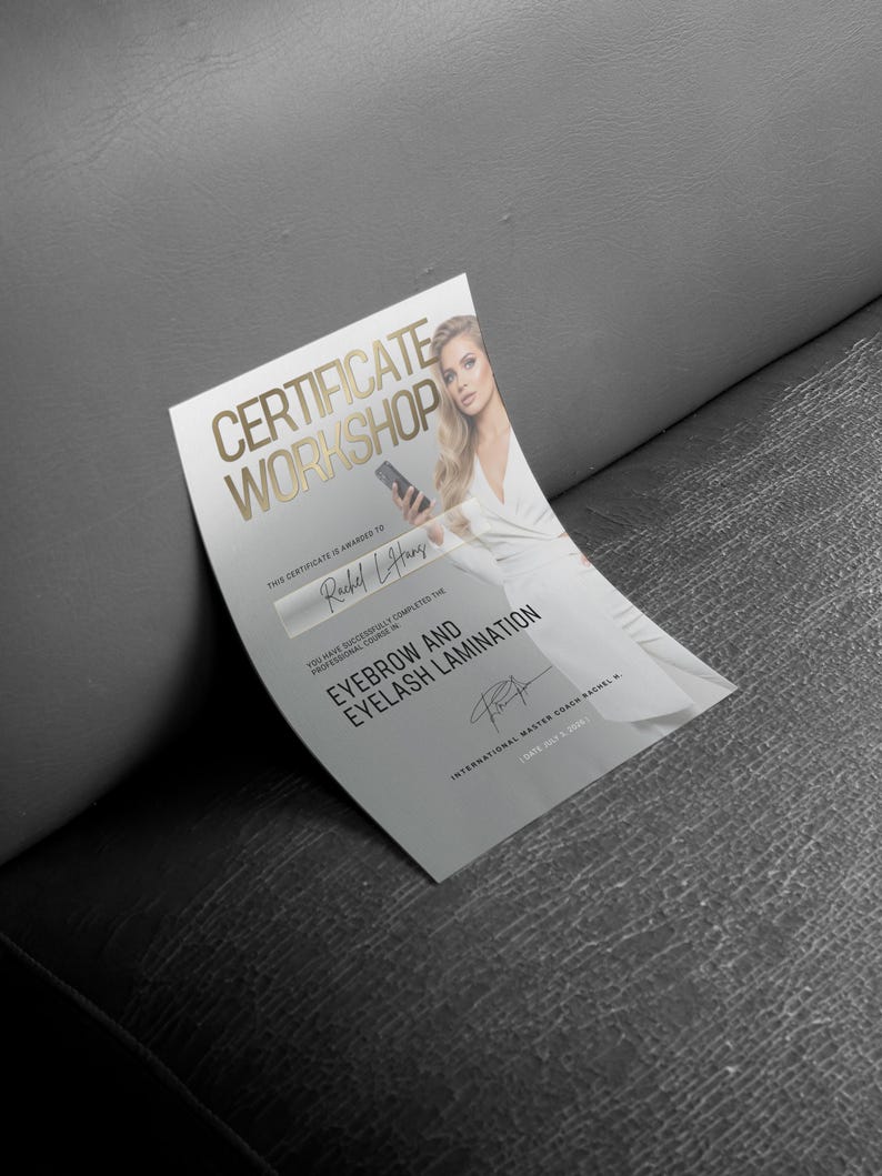 May include: A certificate with gold lettering that reads "CERTIFICATE WORKSHOP" and "EYEBROW AND EYELASH LAMINATION". The certificate is awarded to Rachel Lang. A woman in a white dress is pictured on the certificate.