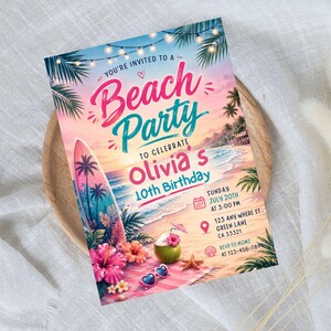 May include: A rectangular beach party invitation card featuring a sunset ocean scene, a surfboard, hibiscus flowers, and a coconut drink. The text reads: You're invited to a Beach Party to celebrate Olivia's 10th Birthday, Sunday July 20th at 3:00 PM, 123 Any Where St. Green Lane CA 33321, RSVP to Moms at 123-456-7890.