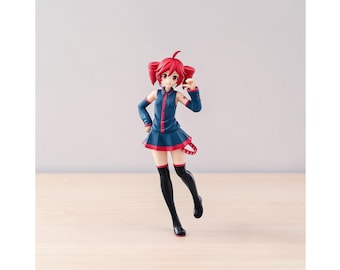 May include: A standing anime-style figurine with bright red hair styled in twin tails. The character wears a dark blue collared shirt with red buttons, a matching pleated skirt with a red hem, black thigh-high stockings, and a small red tail accessory.