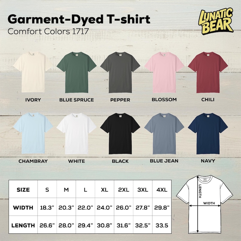 May include: A display of ten different colored, short-sleeved, garment-dyed t-shirts. Colors include ivory, blue spruce, pepper, blossom, chili, chambray, white, black, blue jean, and navy. The image also shows size and measurement details.