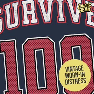 May include: Navy blue graphic design with the word "SURVIVE" in white letters with a red outline, and the number "100" in red with white outlines and diagonal lines. A yellow circle with the text "VINTAGE WORN-IN DISTRESS" is also present.
