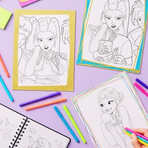 May include: Coloring pages featuring line art illustrations of stylized female figures, with gold and teal glitter borders. Colored markers in various colors and a sketchbook are also present, all on a purple surface.