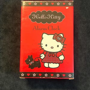 May include: A set of three ceramic mugs with a speckled, cream-colored glaze. Each mug features a different hand-painted floral design in shades of blue, green, and yellow. The mugs have a simple, rounded shape and a comfortable handle.