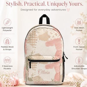 May include: A backpack featuring a beige and dusty pink abstract collage pattern with the name Olivia printed on the front pocket. It includes a top handle, black zippers, a front zipper pocket, and side mesh pockets with adjustable shoulder straps.