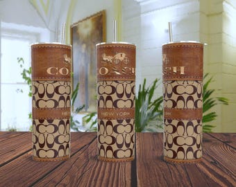 Lyxig designerväska med tumbler