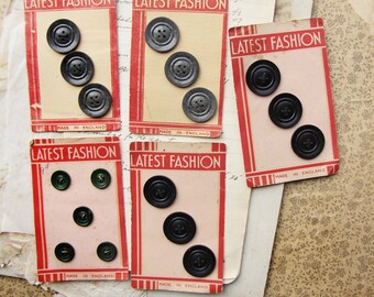 1 packet vintage 1930s hard plastic buttons on original store card - bottle green, speckled grey or black