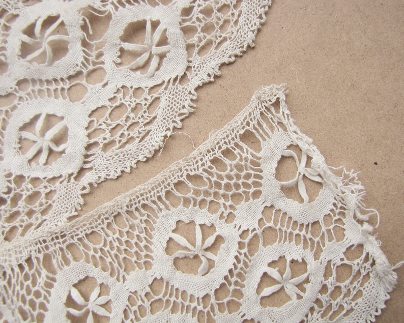 28 inches of handmade cluny bobbin lace edging wide scallop edge with a double flower motif antique lace trim