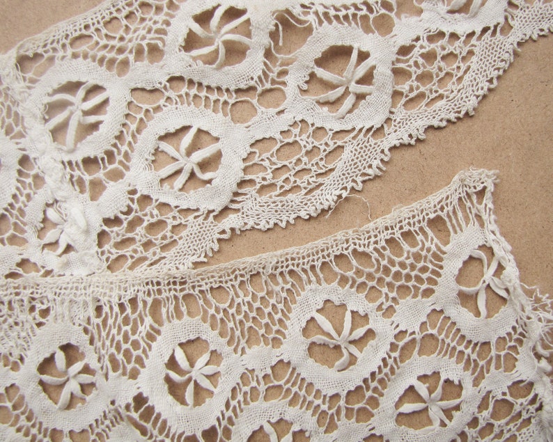28 inches of handmade cluny bobbin lace edging wide scallop edge with a double flower motif antique lace trim