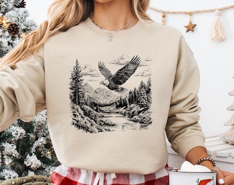 Retro Bald Eagle River Scene Sweatshirt, Boho Birds Of Prey Forest Nature Hoodie