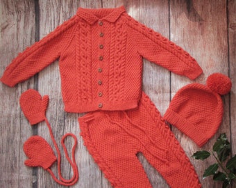 Hand knitted orange, rust red outfit of jacket, cardigan, trousers, leggings, pants, pom pom hat, mittens, traditional set for toddler boy