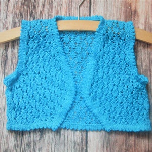 Young little girl's lacy diamond lace stitch hand knitted bright blue summer bolero shrug sleeveless jacket waistcoat original design OOAK image 2