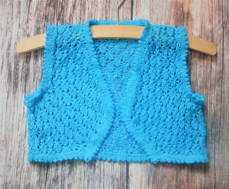 Young little girl's lacy diamond lace stitch hand knitted bright blue summer bolero shrug sleeveless jacket waistcoat original design OOAK image 2