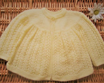 Newborn baby's infant girl or boy traditional handknitted pale yellow handknitted lacy lace matinee jacket cardigan pram outfit set