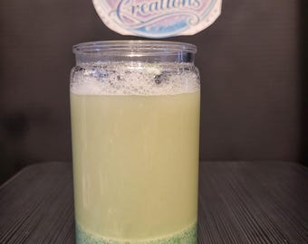 Vaso con forma de bola de nieve decorada con arte en arena