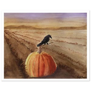 May include: A watercolor painting depicting a large orange pumpkin sitting in a harvested field with a black crow perched on its stem. The background shows a vast, flat landscape under a soft, muted sunset sky with shades of purple and gold.