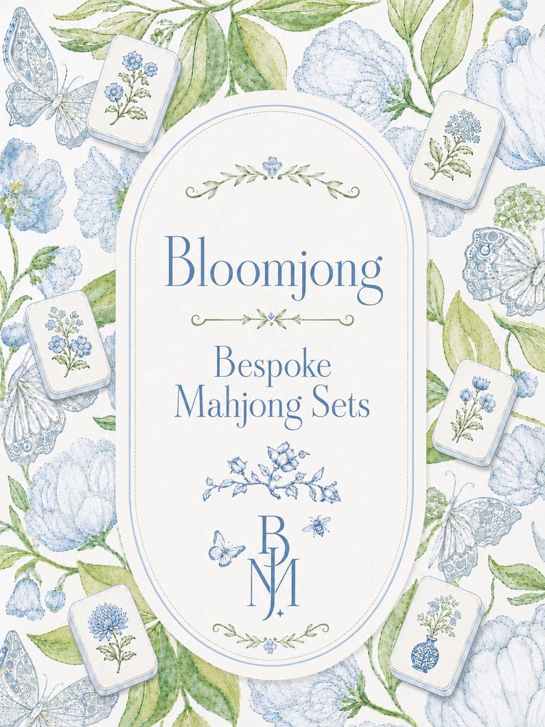 May include: An artistic image featuring a collection of bespoke mahjong sets. The design includes floral and butterfly motifs in shades of blue and green. The text "Bloomjong Bespoke Mahjong Sets" is displayed in an oval frame.