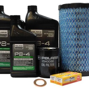 May include: A collection of Polaris engine maintenance products, including black oil bottles, an oil filter, an air filter, spark plugs, and a copper washer. The bottles are labeled with "PS-4" and "PS-4" and the oil filter has the number "2540086".