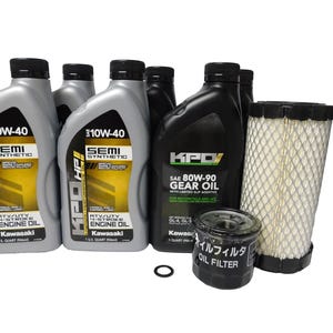 May include: A collection of motorcycle maintenance products, including several gray 10W-40 semi-synthetic engine oil bottles, a black gear oil bottle, an oil filter, and an air filter. The oil bottles are labeled "Kawasaki".