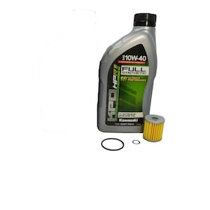 May include: A Kawasaki 10W-40 full synthetic engine oil bottle, oil filter, and two rubber O-rings. The oil bottle is silver and black with green accents. The oil filter is yellow and gray.