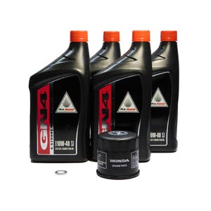 May include: A set of four black engine oil bottles with orange caps, a black oil filter, and a silver washer. The bottles have red and white labels with the text "GN4 4-STROKE MOTOR OIL" and "10W-40 SI". The oil filter has the text "HONDA GENUINE PARTS".