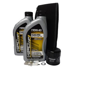 May include: A collection of Kawasaki engine maintenance products, including two bottles of 10W-40 semi-synthetic engine oil, an air filter, an oil filter, and two spark plugs. The oil bottles are gray with black and yellow labels.
