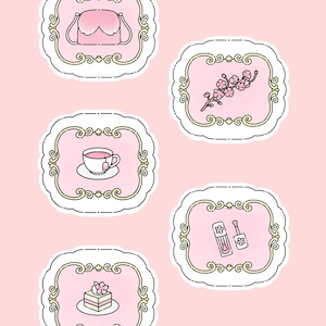May include: A collection of five pink and white illustrated stickers. The stickers feature a sleep mask, a sprig of flowers, a teacup with a tea bag, nail polish, and a slice of cake. Each sticker is framed with a decorative border.