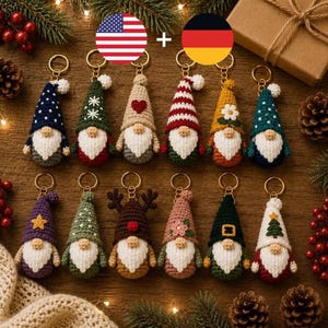 May include: A collection of twelve crocheted gnome keychains arranged in two rows. Each gnome features a unique hat design, including patterns like stripes, stars, flowers, and trees, paired with a white crocheted beard and a small round nose.