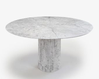 Round designer table in white Carrara marble