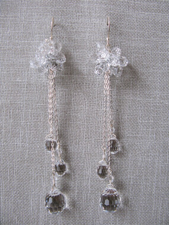 Items similar to Swarovski crystal daisy & sterling silver dangly