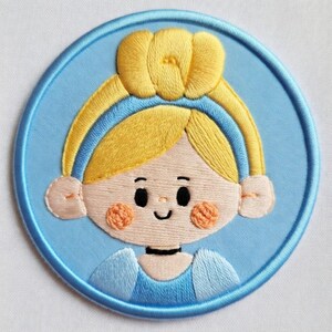 May include: A set of three ceramic mugs with a speckled, matte finish in cream, light grey, and dark grey. Each mug has a simple, minimalist design and a rounded handle.