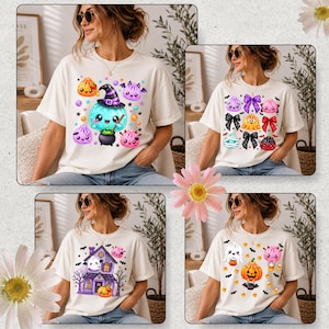 Peut inclure: Un t-shirt à manches courtes de couleur crème présentant quatre motifs graphiques distincts. Les imprimés incluent un fantôme bleu sarcelle avec un chaudron, divers nœuds, une maison hantée violette et une citrouille avec un fantôme, en style cartoon.