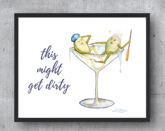 May include: A framed art print with a humorous illustration of two olive characters lounging in a martini glass. The print includes the navy blue text "this might get dirty" on a white background, perfect for a kitchen or bar.